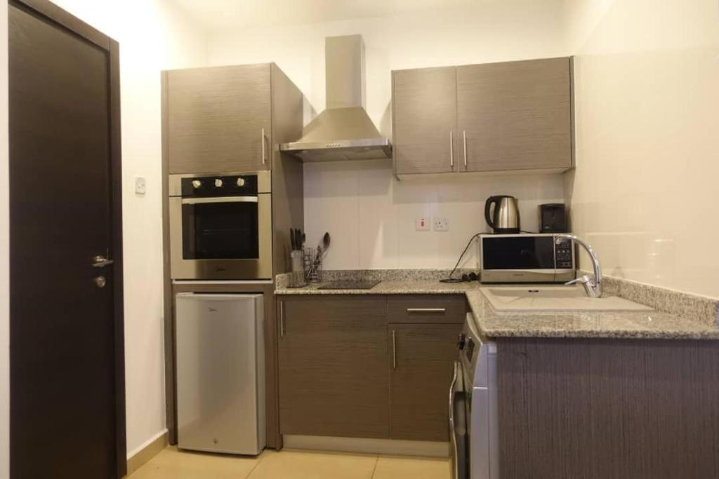 The Gallery Luxury Suites Cpg East Legon Extérieur photo